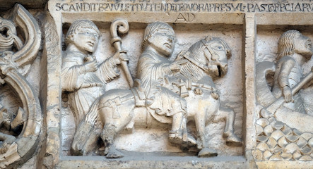 Scenes from the life of St. Geminianus : journey of San Geminianus  to the east to free the daughter of Byzantine emperor Jovian, from the devil, bass relief by Wiligelmo, Modena Cathedral, Italy 