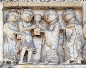 Scenes from the life of St. Geminianus : Geminianus  receives the gift of the Byzantine emperor Jovian, bass relief by Wiligelmo, Modena Cathedral, Italy 