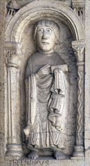 Fototapeta na wymiar Saint Philip the apostle, bass relief by followers of Wiligelmo, Princes’ Gate, Modena Cathedral, Italy 