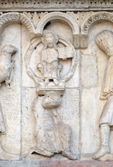 Plate with stories from Genesis: Story about Abel and Cain, God the Father, relief by Wiligelmo, Modena Cathedral, Italy 