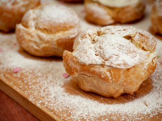 Naklejka premium Delicious tender profiteroles