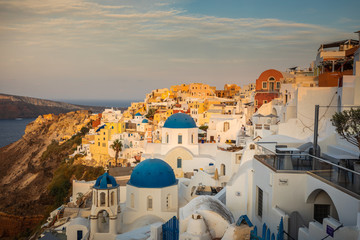 Santorini greece famous Oia in sunset time golden hour 