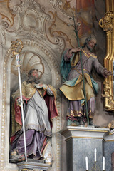 Obraz premium Saints Augustine and Joseph, statues on the main altar in the parish church of Assumption in Marija na Muri, Croatia 