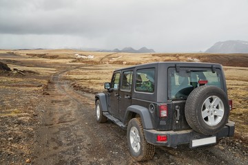 Fototapeta na wymiar Car on Icelandic terrain