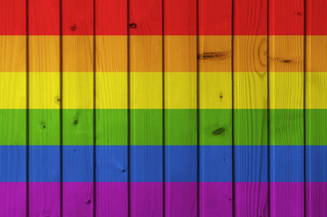 Flag of LGBT on the background of wooden boards. Wallpaper for installation and design. Space for...