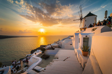 Santorini greece famous Oia in sunset time golden hour 