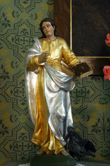 Saint John the Evangelist, statue on the Sacred Heart of Jesus altar in the Parish Church of the...