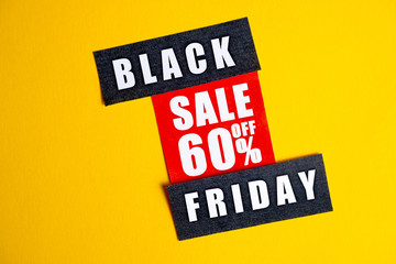 Black Friday sale concept. Sixty percent discount. Sale sticker on yellow background.