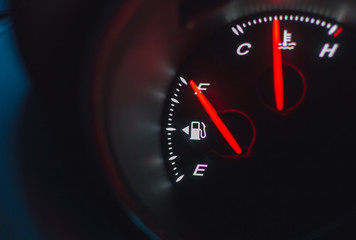 Close up shot of a speedometer in a car.