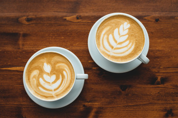 Two cups of cappuccino