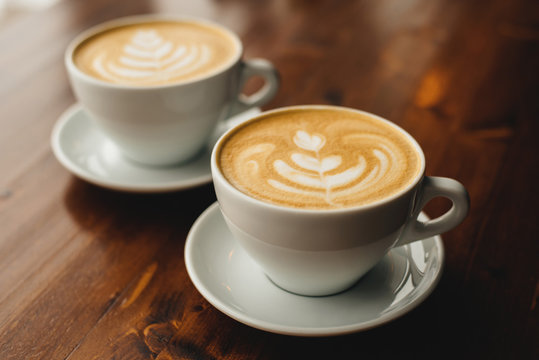 Two cups of cappuccino