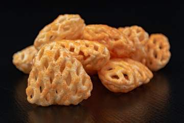 Fresh fudges on a dark kitchen table. Tasty snacks to crunch.