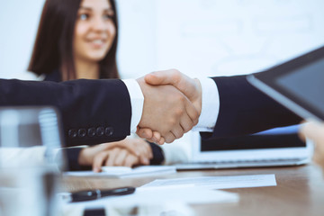 Business people shaking hands at meeting or negotiation in the office. Handshake concept. Partners are satisfied because signing contract