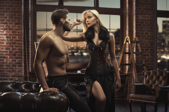 Muscular, handsome man looking at his sexy lover