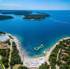Aerial drone shot of Verudela bay near Pula, Croatia. A popular touristic destination.