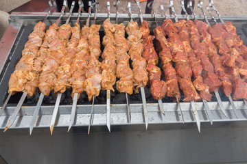 Street food. Skewers are ready for roasting.