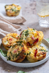 Delicious egg muffins with ham, cheese and vegetables