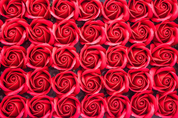 Red rose flower made from soap close-up background