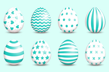 Set of realistic easter decorated eggs on turquoise background.
