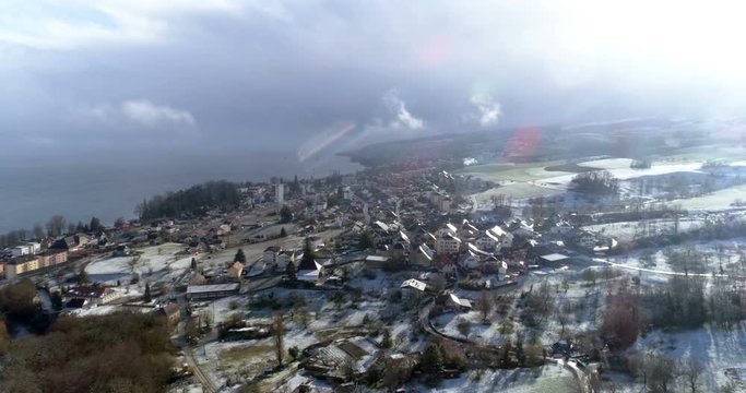 Gorgier snowing approach - Aerial 4K