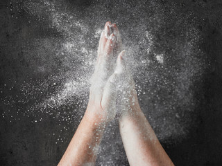 baker hands with flour in motion