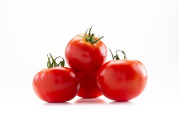 Red tomato raw ripe vegetable for food isolated on white,  green.
