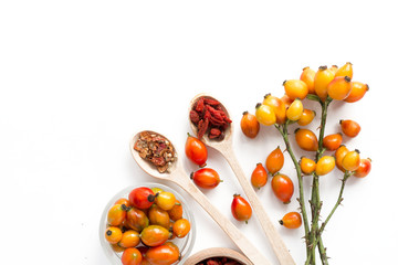 Medicinal plants and herbs composition: Dog rose, bunch branch Rosehips, types Rosa canina hips tea, essential oil. bunch, dried flowers of linden and chamomile elderberries and goji berries