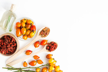 Medicinal plants and herbs composition: Dog rose, bunch branch Rosehips, types Rosa canina hips tea, essential oil. bunch, dried flowers of linden and chamomile elderberries and goji berries