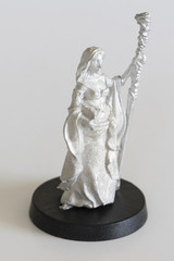 Woman sorceress with stick - pewter figurine.