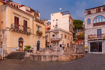 Fototapeta na wymiar Taormina. Sicily. City fountain.