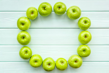 summer food with apples on light wooden background top view pattern