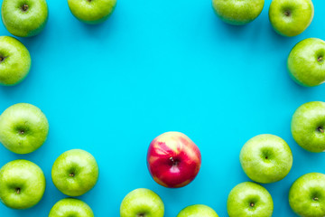 summer fruit pattern with apples on blue colorful background top view copyspace