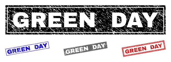 Grunge GREEN DAY rectangle stamp seals isolated on a white background. Rectangular seals with grunge texture in red, blue, black and gray colors.