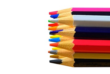 Colored pencils, isolated on a white background. Colored pencils on white background and space for text or image. Back to school concept. Drawing concept. Close up. Copy space