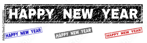 Grunge HAPPY NEW YEAR rectangle stamp seals isolated on a white background. Rectangular seals with grunge texture in red, blue, black and gray colors.
