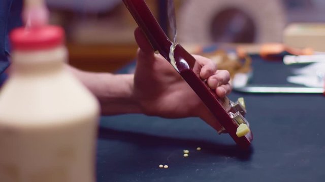 Glueing broken guitar neck, close up