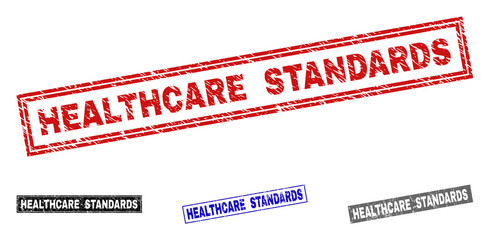 Grunge HEALTHCARE STANDARDS rectangle stamp seals isolated on a white background. Rectangular seals with grunge texture in red, blue, black and gray colors.