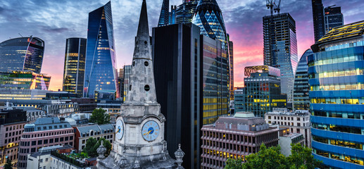 Aerial view of skyscrapers of the world famous bank district of central London after dusk, 