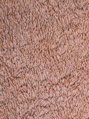 beige fabric terry cloth towel texture. background, bedroom.