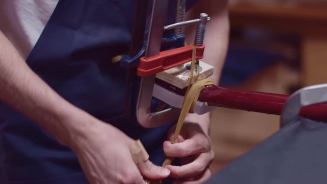 Guitar maker repair broken headstock