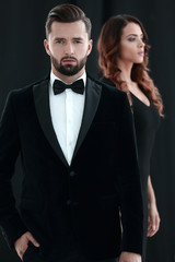 gentleman with his girl posing in the studio