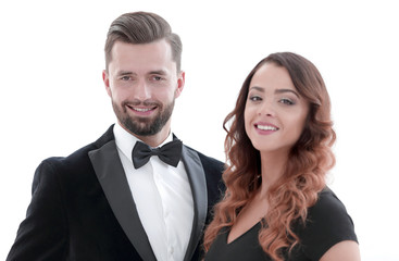 Portrait of a handsome man looking at the camera with a woman