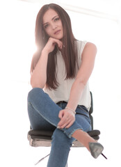 Fototapeta na wymiar young successful woman sitting in a chair