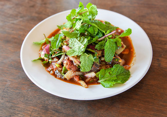 Spicy minced beef salad raw meat beef slice mixed with spices and herbs