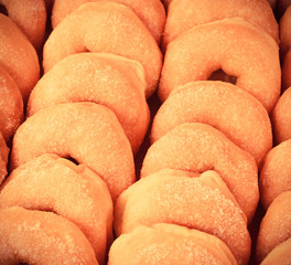 donut background / sweet donut dessert cook homemade with sugar on circle donut delicious