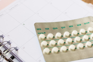 Contraceptive oral pill on schedule. Days of the week in Portuguese. Brazil.