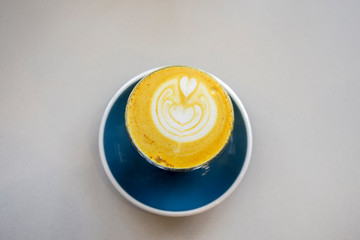 Turmeric latte in the cup