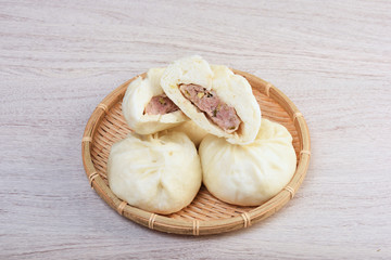 Steamed stuffed buns on a plate  
