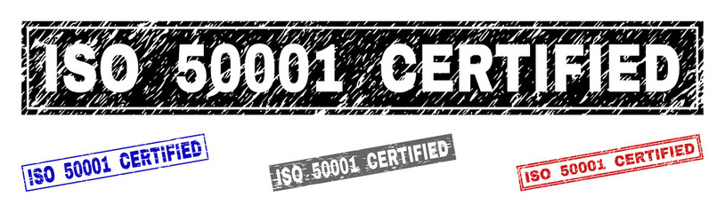 Grunge ISO 50001 CERTIFIED rectangle stamp seals isolated on a white background. Rectangular seals with distress texture in red, blue, black and gray colors.