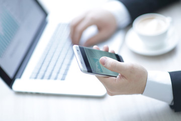 closeup. business man working with financial charts